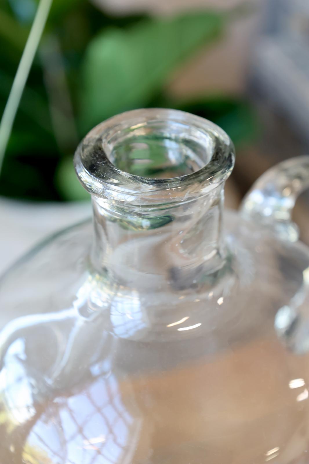 Flasche mit Messanzeige, durchsichtig/ klar. H: 32cm. D: 18cm.